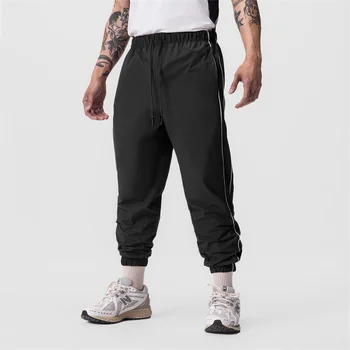 Yeni ince Elastik koşucu pantolonu erkek sweatpants Örgü Nefes spor Çabuk Kuruyan Spor dipleri Rahat Koşu pantolon